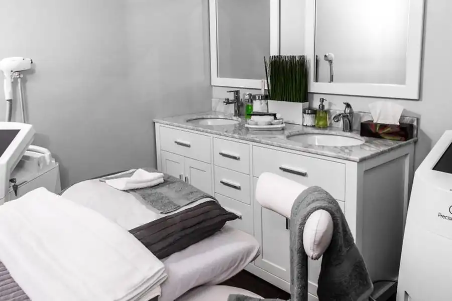 An equipped aesthetic treatment room with clinical devices